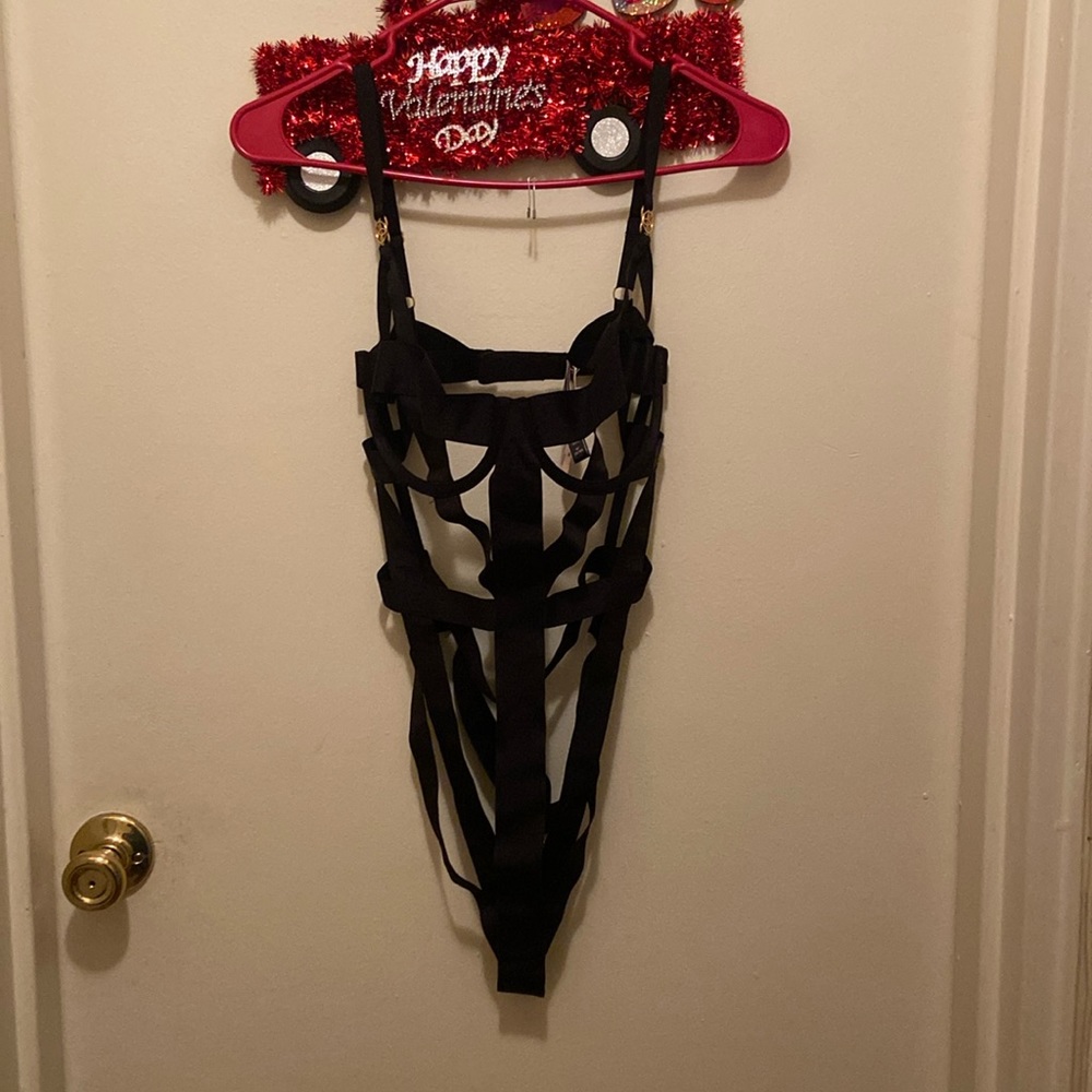 Victoria’s Secret black bondage strap lingerie thong size medium. Brand new.